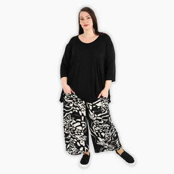  Ballonhose in Schwarz-Ecru mit abstraktem Muster für stilvolle Lagenlooks im Frühling/Sommer